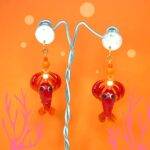 Homard bouclé d’oreille unique création artisanat